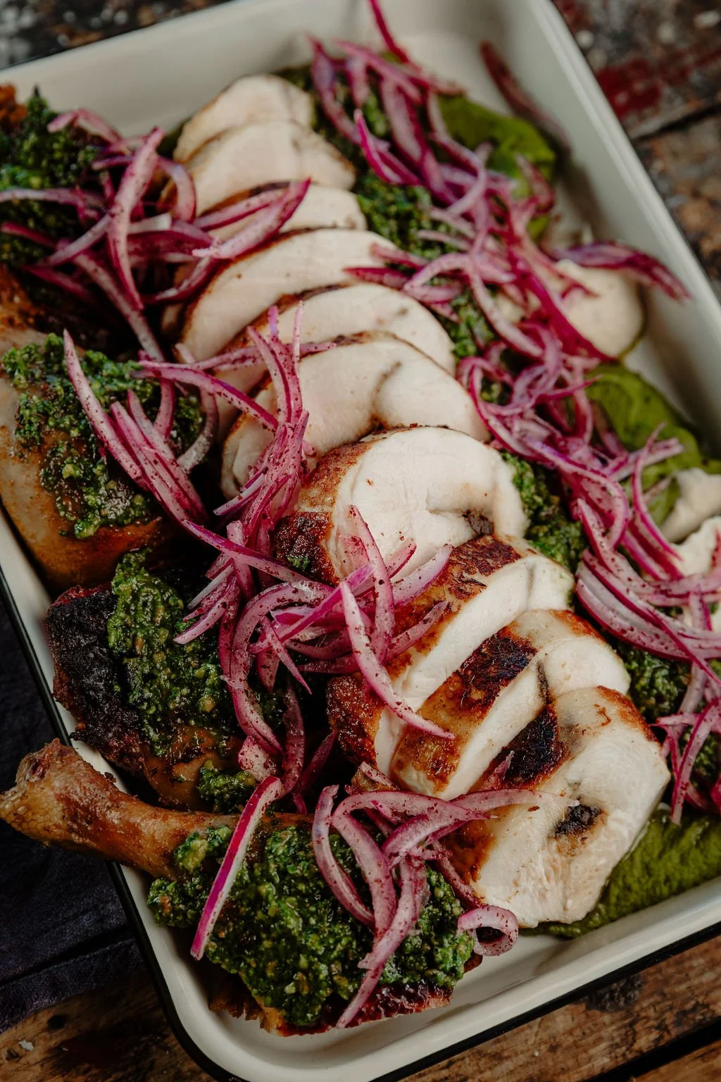 Grilled chicken with chimichurri sauce and pickled onions at Applecroft Catering Waldoboro Maine