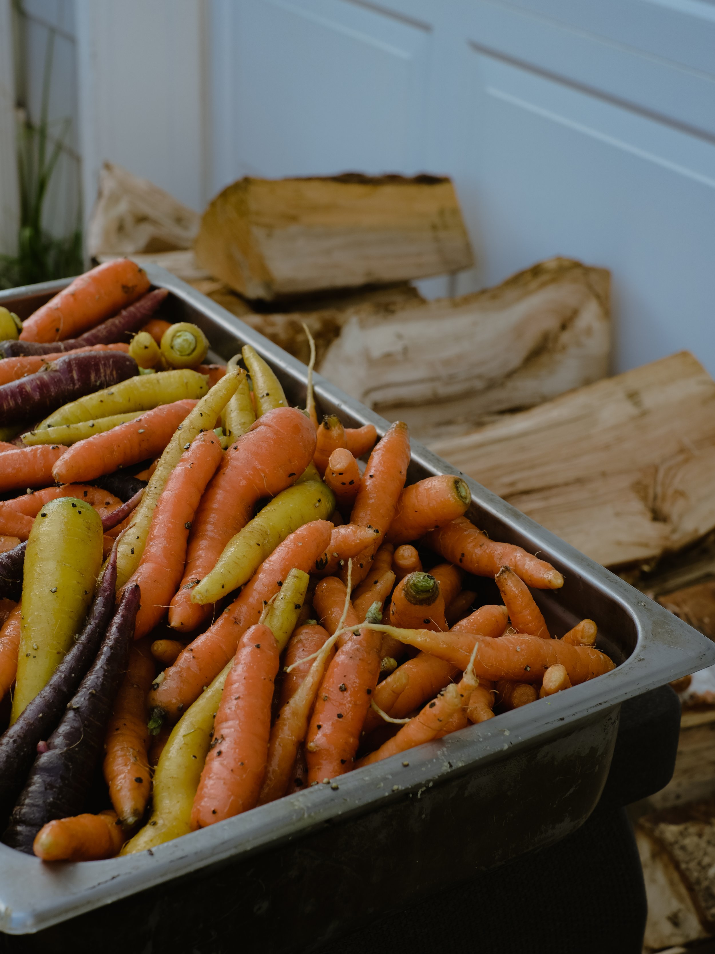 Carrots and firewood Applecroft Farmstand