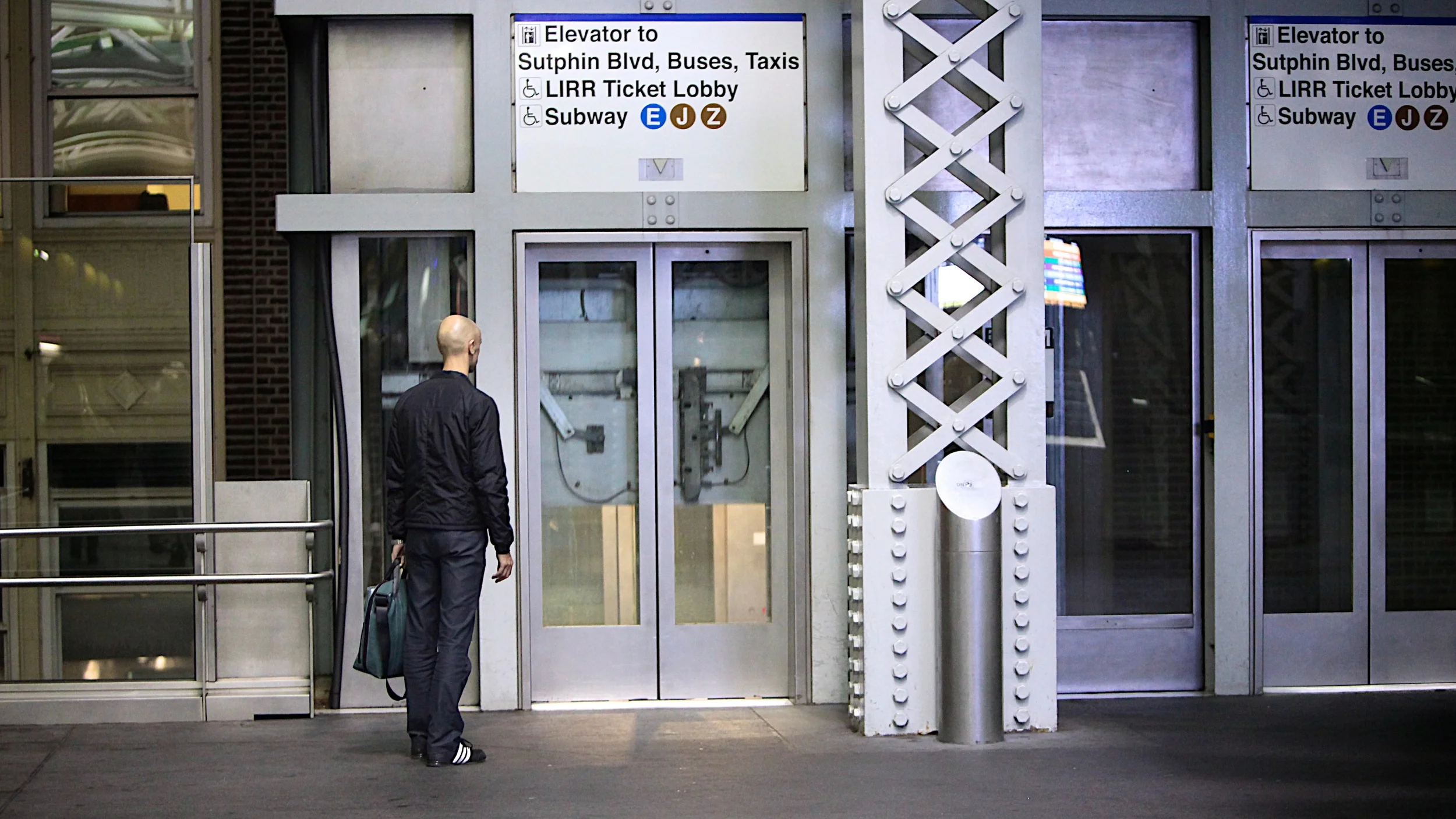 Waiting for the elevator at Jamaica station