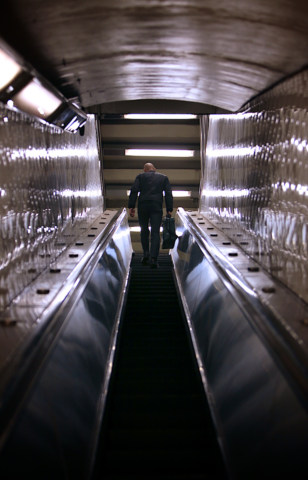 Taking the escalator at Lexington Av - 53rd St.