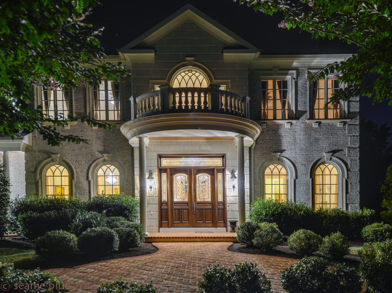 Over-faked HDR treatment of a mansion, glitzed up for real estate selling.
