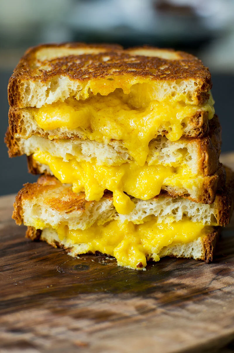 Ooey, gooey, melted cheddar style Legit Cheese in a grilled cheese sandwich. Are you drooling yet?