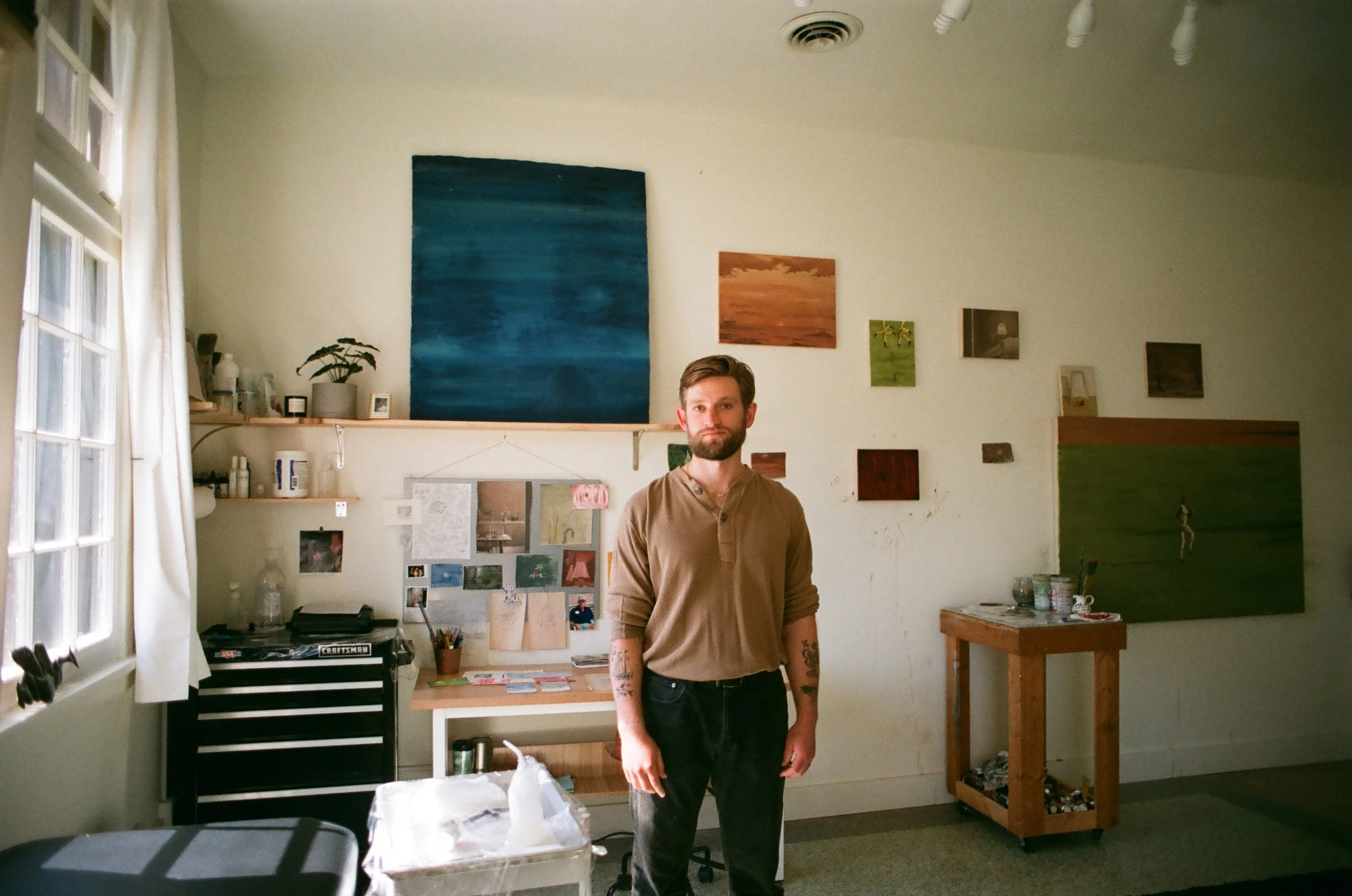 Artist at their studio ft. faithful companion
