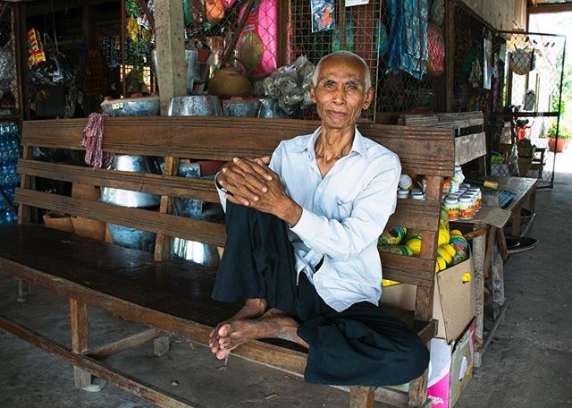 The hardest part of traveling for me is the language barrier. It creates a never ending obstacle that I must overcome each day. This is a portrait of a man and his shop. We conversed very little but all I could understand was &quot;Favorite seat&quot