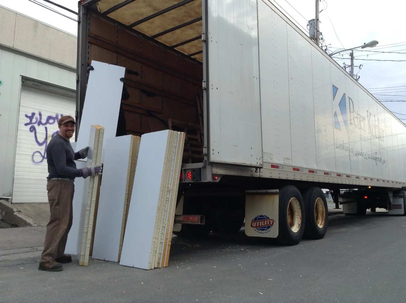 18. Construction - Unloading Steel Door Cut Outs.jpg