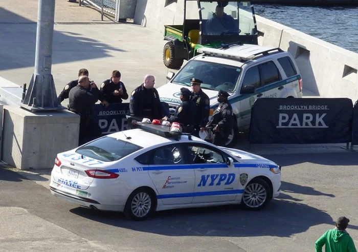 "Police closed down Brooklyn Bridge Park’s Pier 2 in April 2016 after large crowds, violent incidents and death threats on Facebook. Photo by Mary Frost"