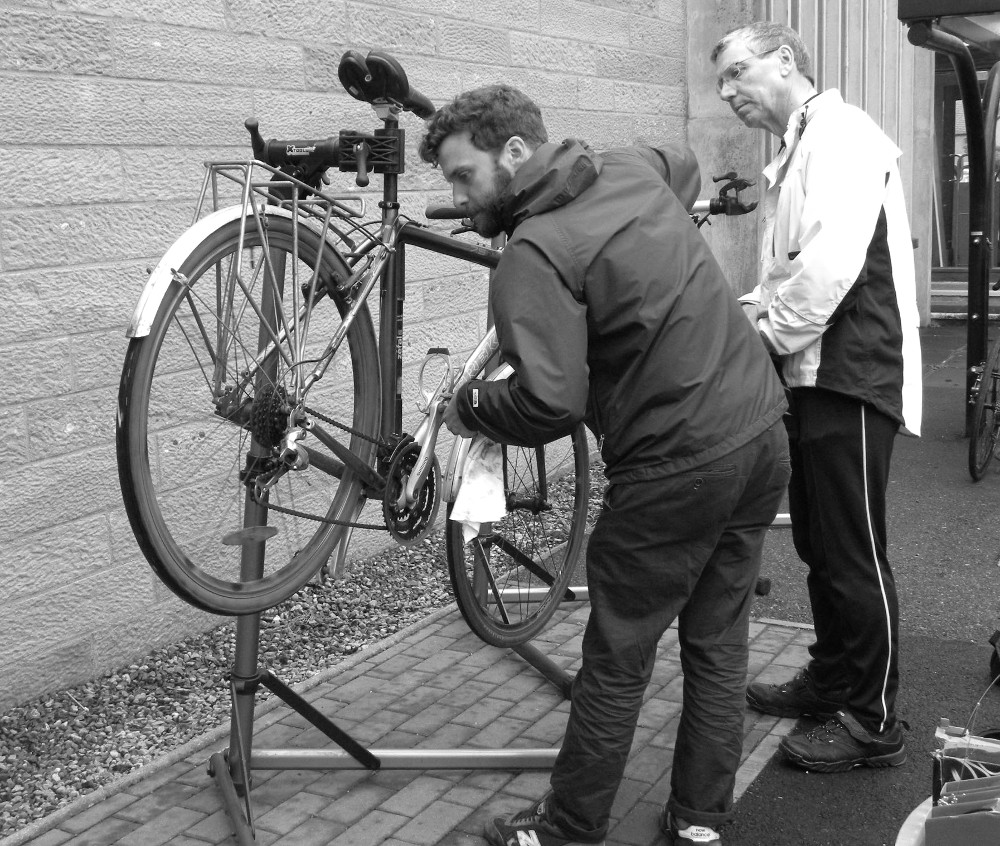 Duncan giving mechanical advice at a Highland Council office