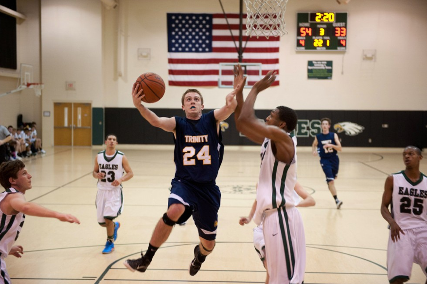 Hansen French, a captain for the Lions, makes a shot against the Oakwood Eagles in Greenville, NC. The Lions were defeated 71-49, but "fought hard against a highly talented team," Coach Huff said after the game.