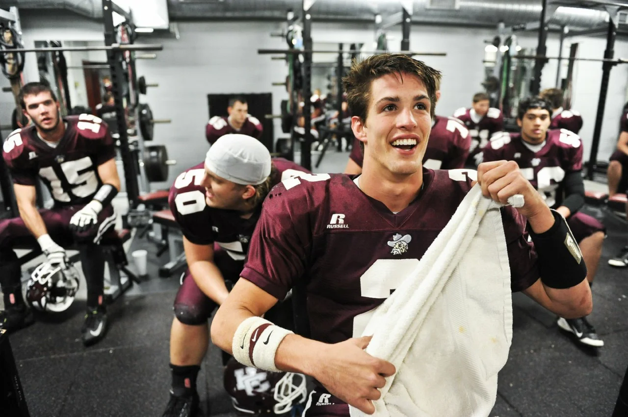Hunter Comer, quarterback of the Henderson County High School's varsity football team, was all smiles at halftime of the homecoming game with a 42-0 lead.