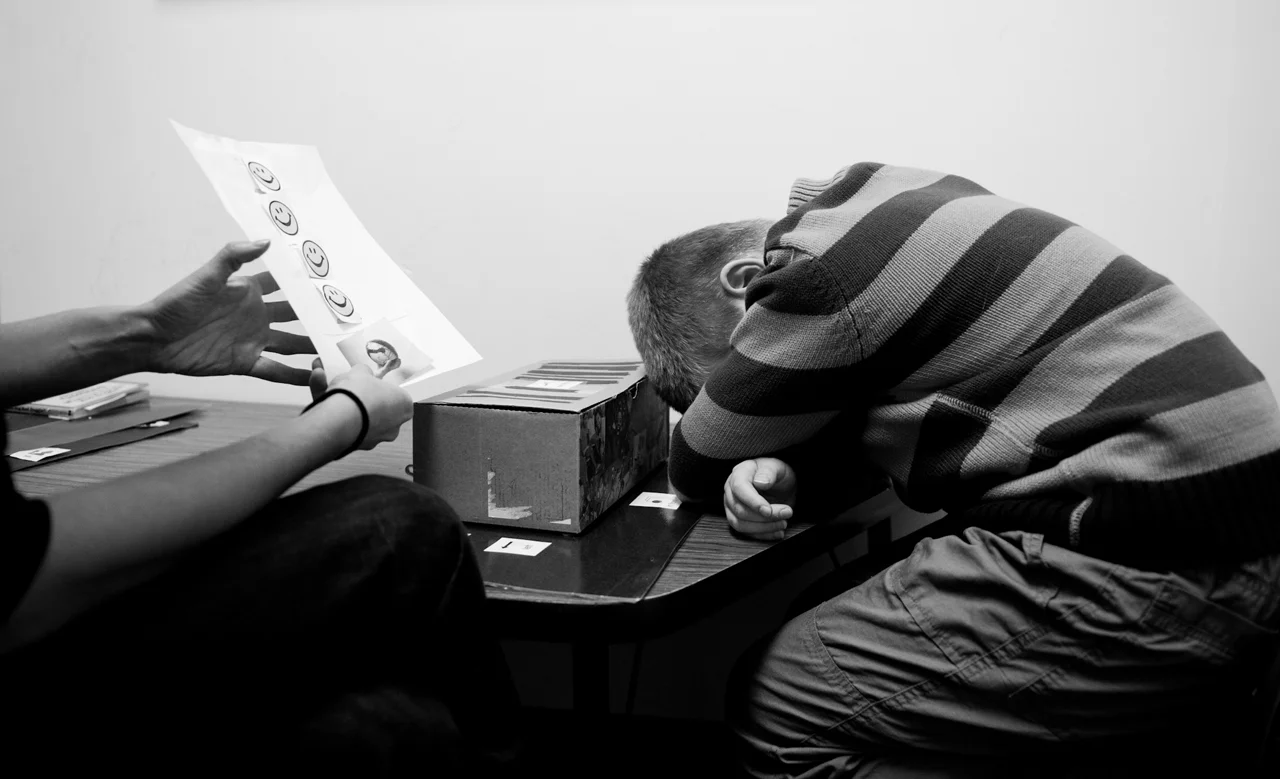 Marcus has a one-on-one session with his teacher, Kim Lopes, at Middle Creek School. He has been in the same autism-specific classroom for two years. However, he must move up to a higher class level next year, despite being unprepared for the material. 