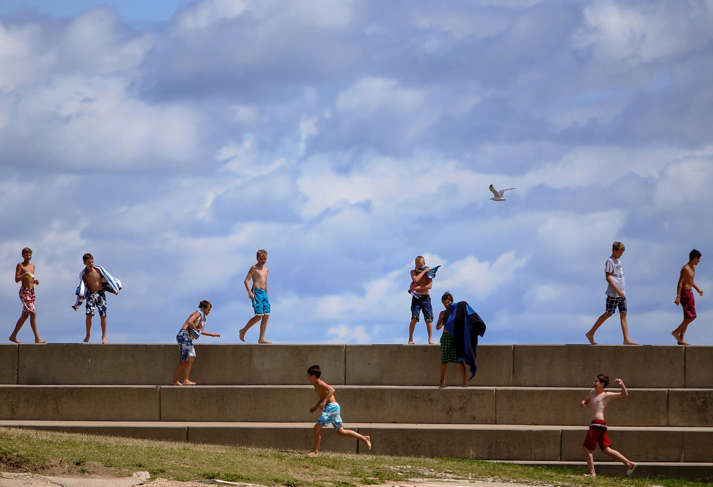  Children play along the 12th Street Beach in Chicago on August 13, 2013. &nbsp;Lifeguards had told them to get out of Lake Michigan because of rip tides and high levels of e. coli. &nbsp; 