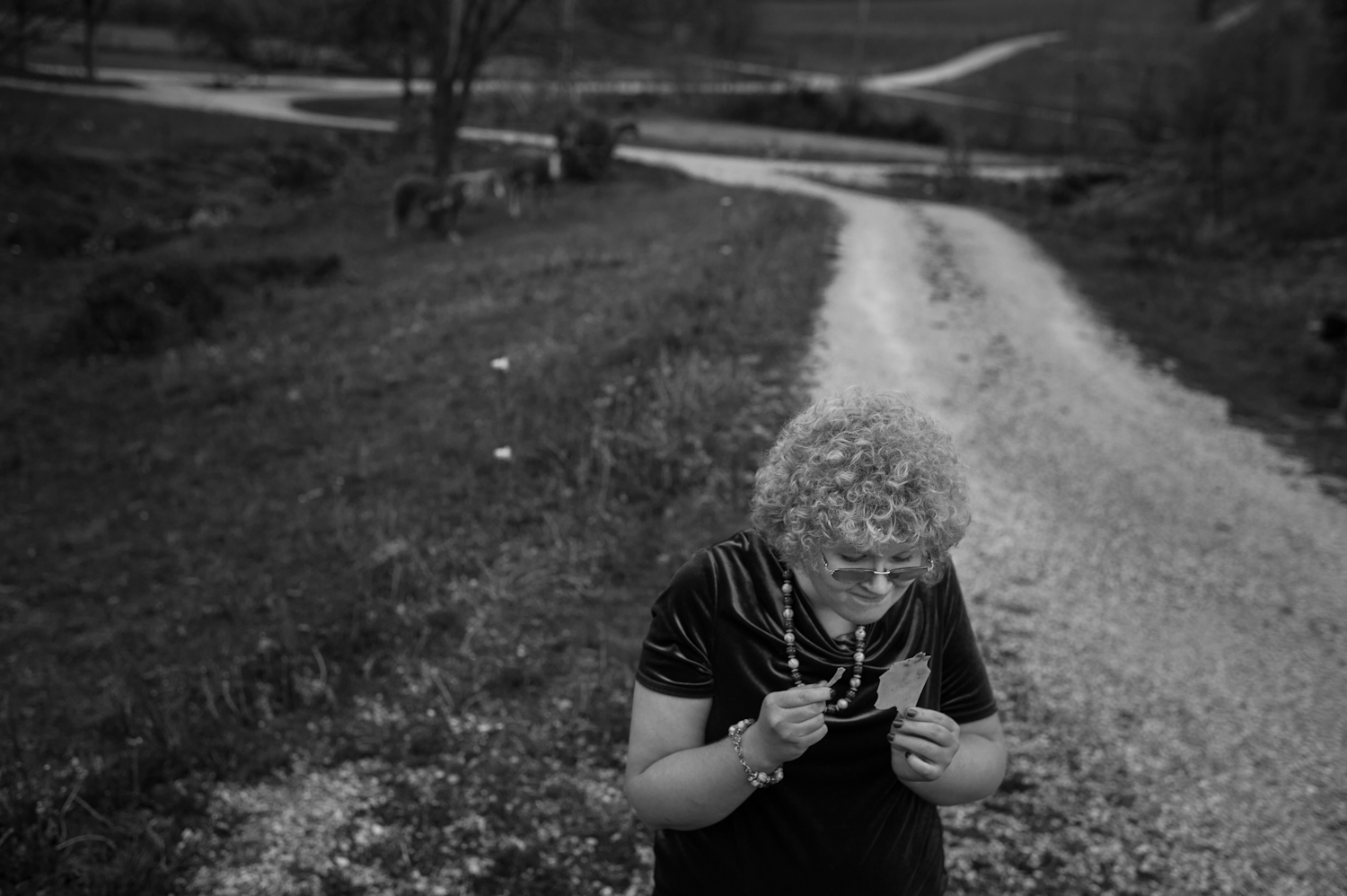 People with autism often have habits that help release their feelings of being overwhelmed or frustrated. For Casey that habit is shredding. Casey shredded a piece of plastic while walking along her family's driveway in Birdseye on April 27. 