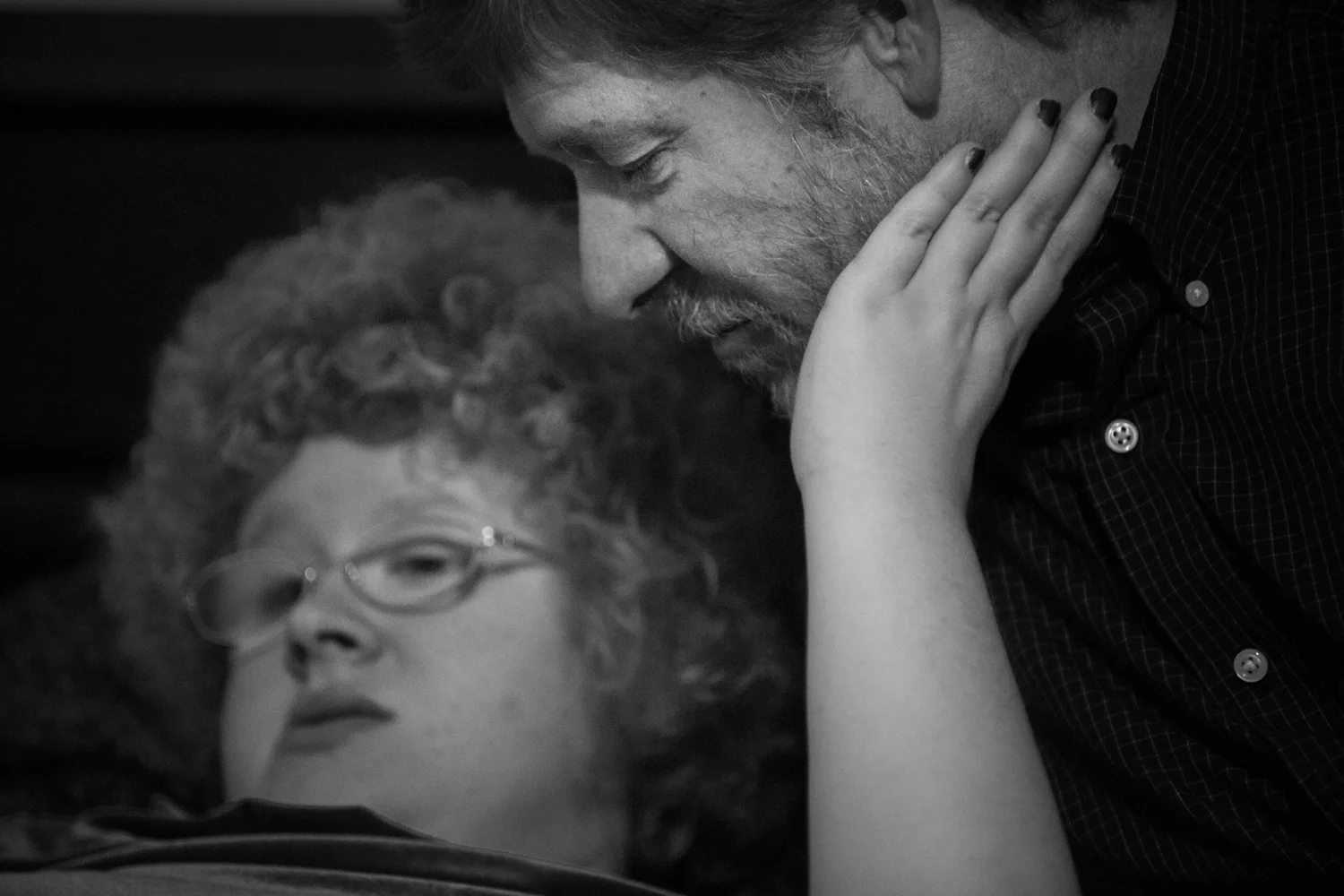 Casey always loved to place both hands on Doug's beard as a tactile stimulant, a common desire for people with autism; however, on this night, the first night in her new home, she did not want to make eye contact or fully engage with her dad, because she knew they were leaving her. That did not stop her from wanting to feel his beard though. 