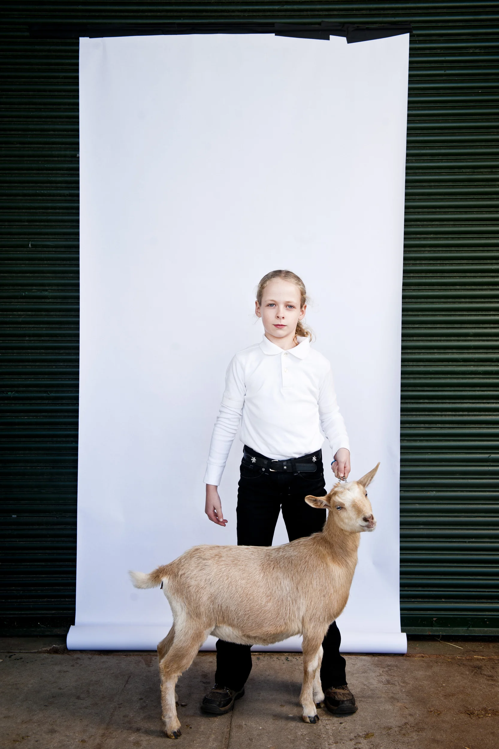  Samantha Seitter, 10, and Ava stand&nbsp;for a portrait&nbsp;at the North Carolina State Fair on October 25, 2013. 