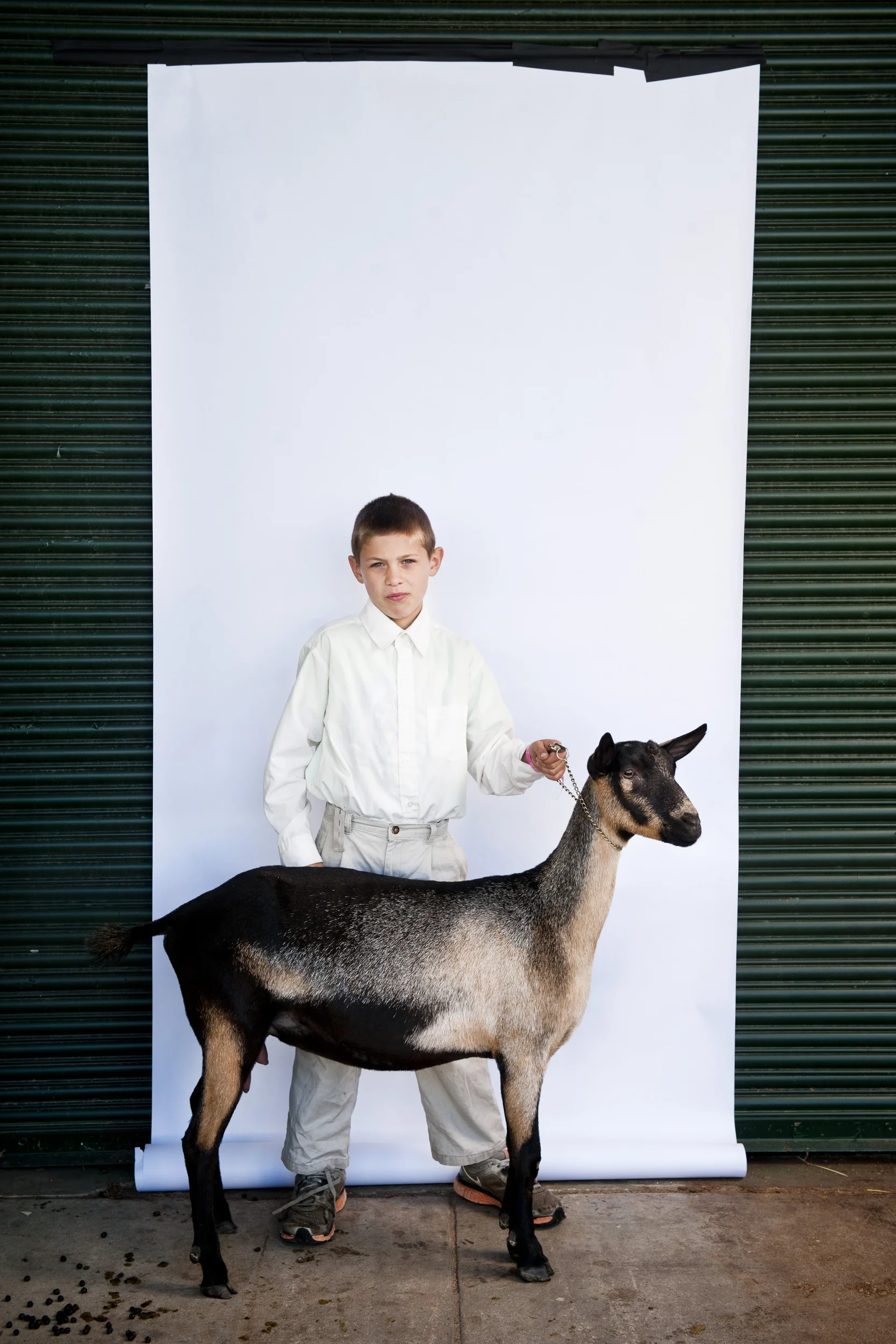  Ethan Johnson, 9, and Darby stand&nbsp;for a portrait&nbsp;at the North Carolina State Fair on October 25, 2013. 