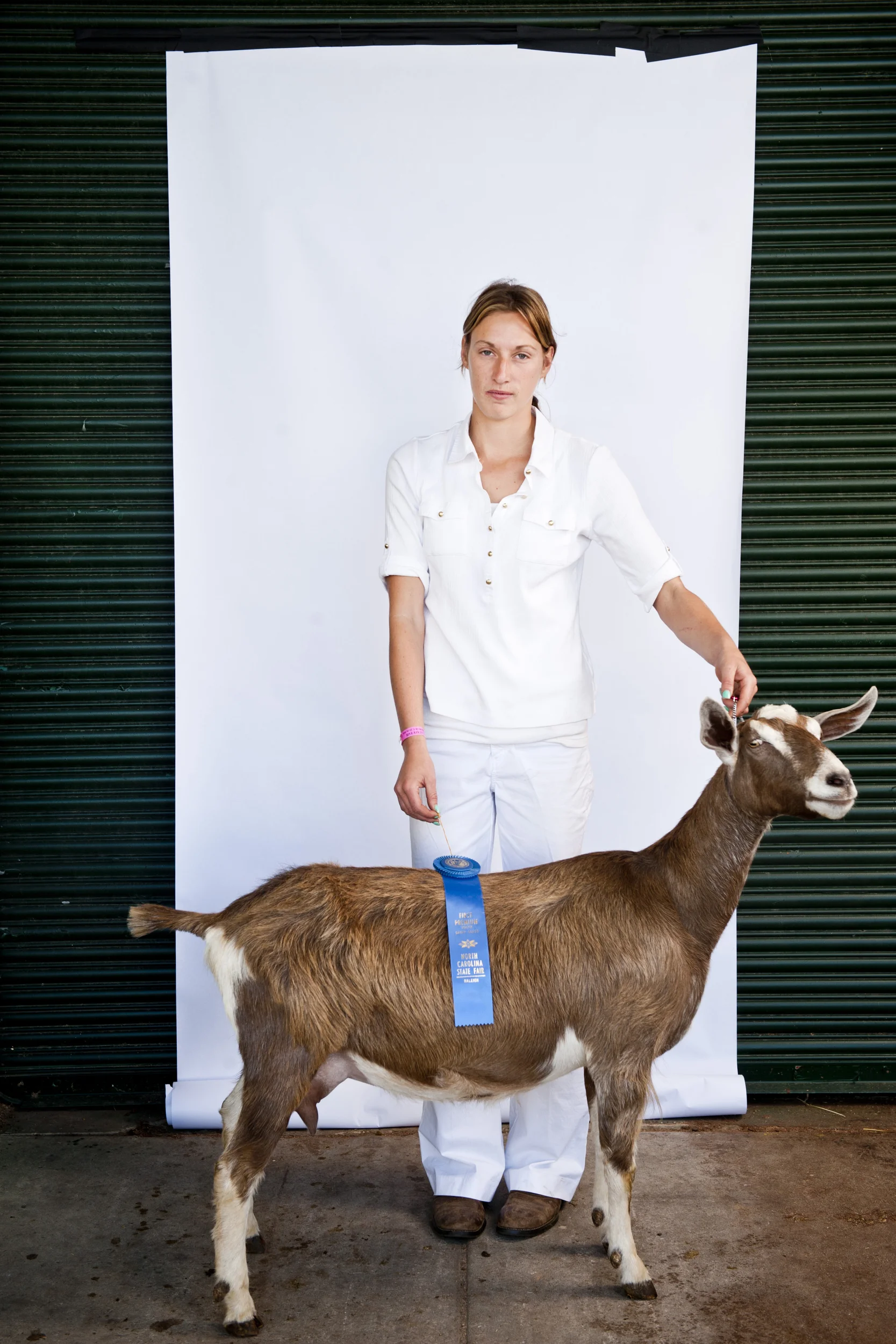 Allison Stumbo, 20, and Matilda stand&nbsp;for a portrait&nbsp;at the North Carolina State Fair on October 25, 2013. 