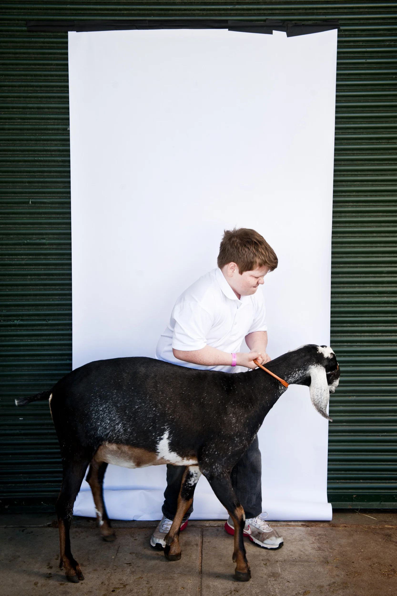  David Carlson, 12, and Gigi stand&nbsp;for a portrait&nbsp;at the North Carolina State Fair on October 25, 2013. 