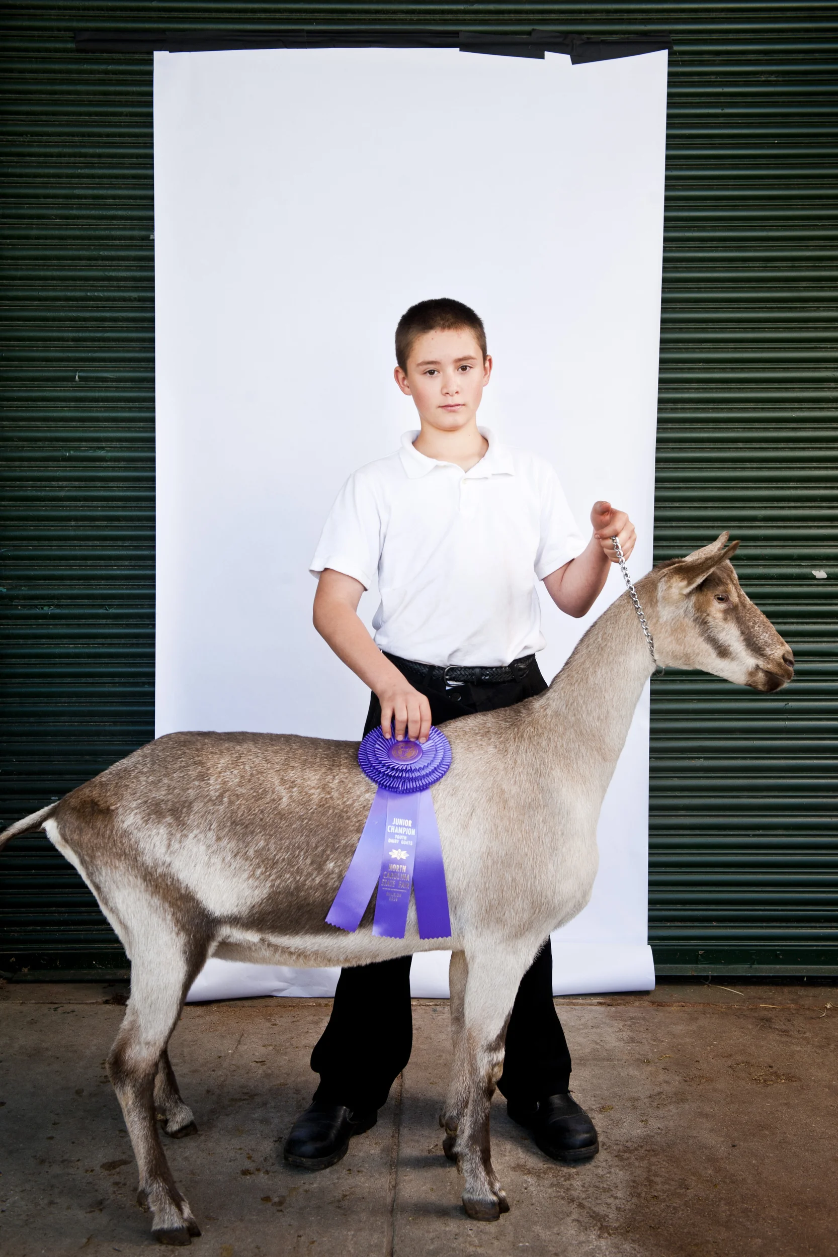  Elri Bell, 12, and Chewy stand&nbsp;for a portrait&nbsp;at the North Carolina State Fair on October 25, 2013. 