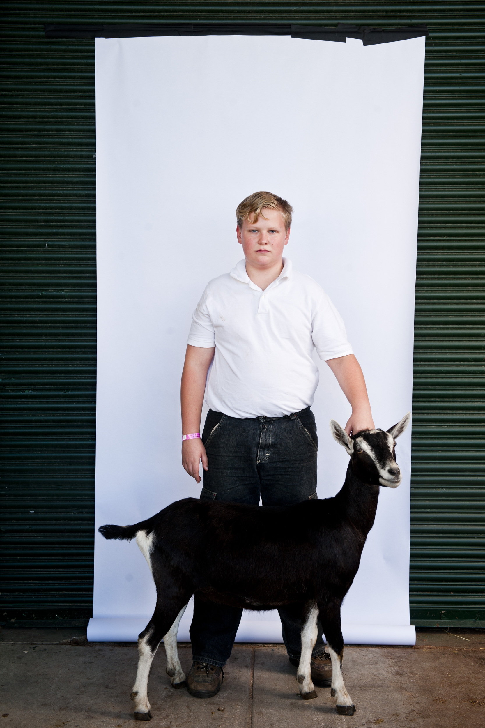 Joshua Seitter, 12, and Whiskey Lullaby at the North Carolina State Fair on October 25, 2013. This image is a part of a portrait series called "Fair Kids."