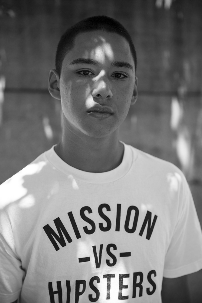 Oscar Ramos, 17, stands for a portrait outside of City Hall in San Francisco, Calif. on June 2, 2015. Ramos was born and raised in the Mission neighborhood. "My family moved here from Puerto Rico 89 years ago," he said. "We have lived in the Mission for five generations. Our community is fading away, because people are getting evicted."