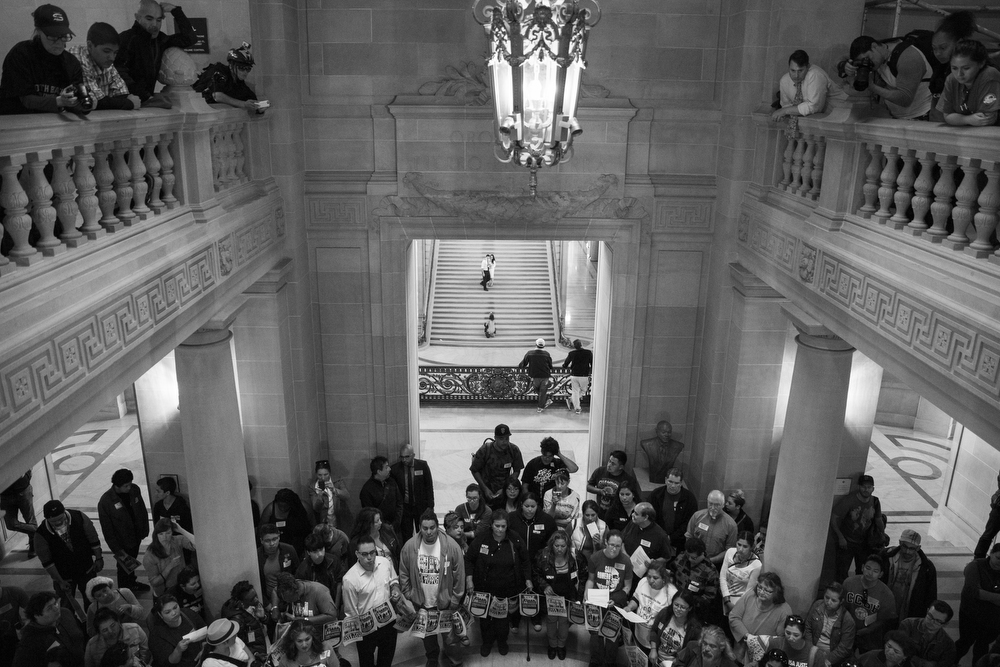Supporters of the Mission Moratorium gathered in City Hall in San Francisco, Calif. on June 2, 2015. Making a plea to his fellow San Francisco Board of Supervisors members, District 9's David Campos said, "How would you feel to hear from your constituents and hear how powerless they feel?" Only approximately nine percent of the 500 housing units built in the Mission district in the last five years have been affordable.