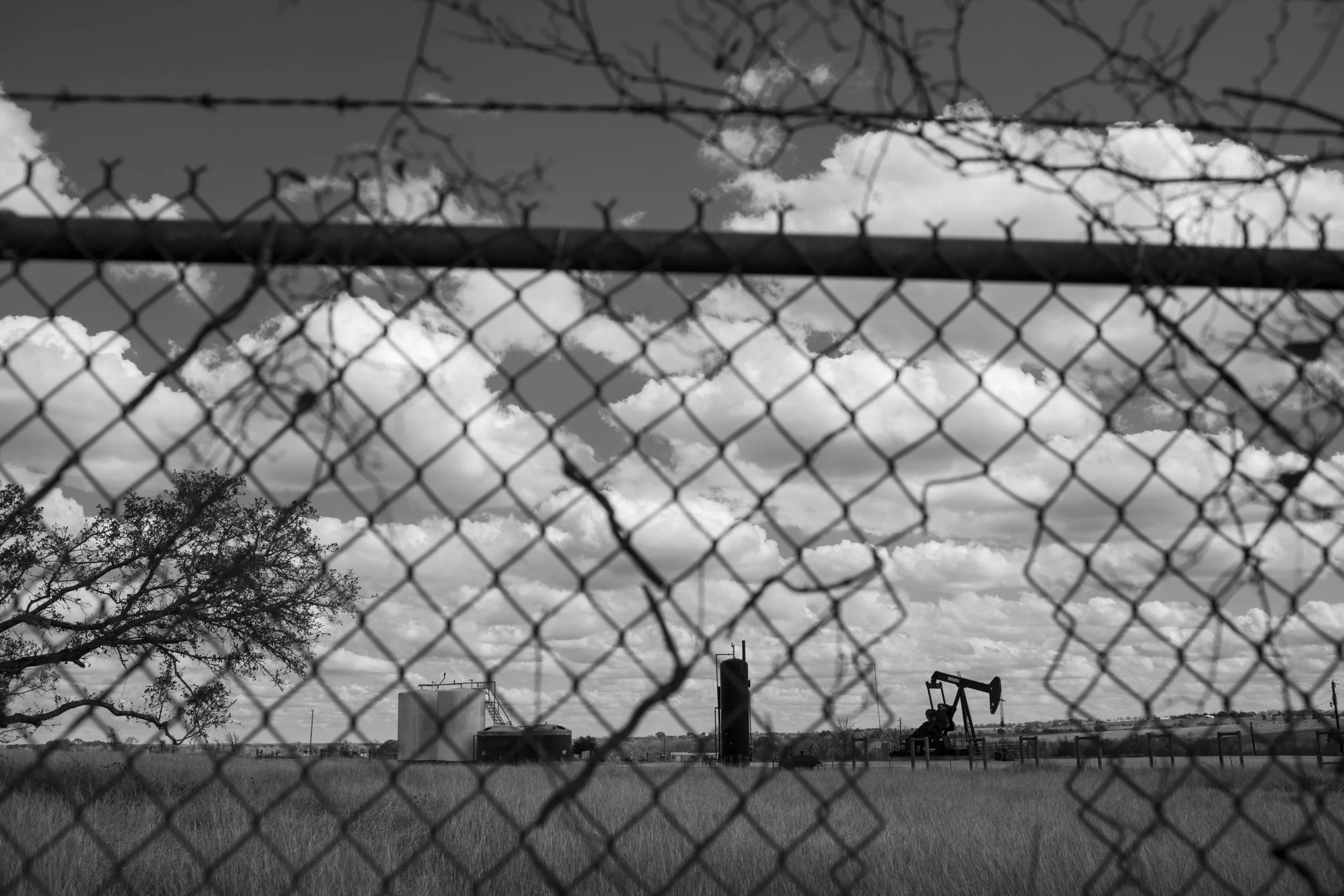 A pump jack stands next to a picnic area outside of LaGrange, Texas on February 19, 2015. 