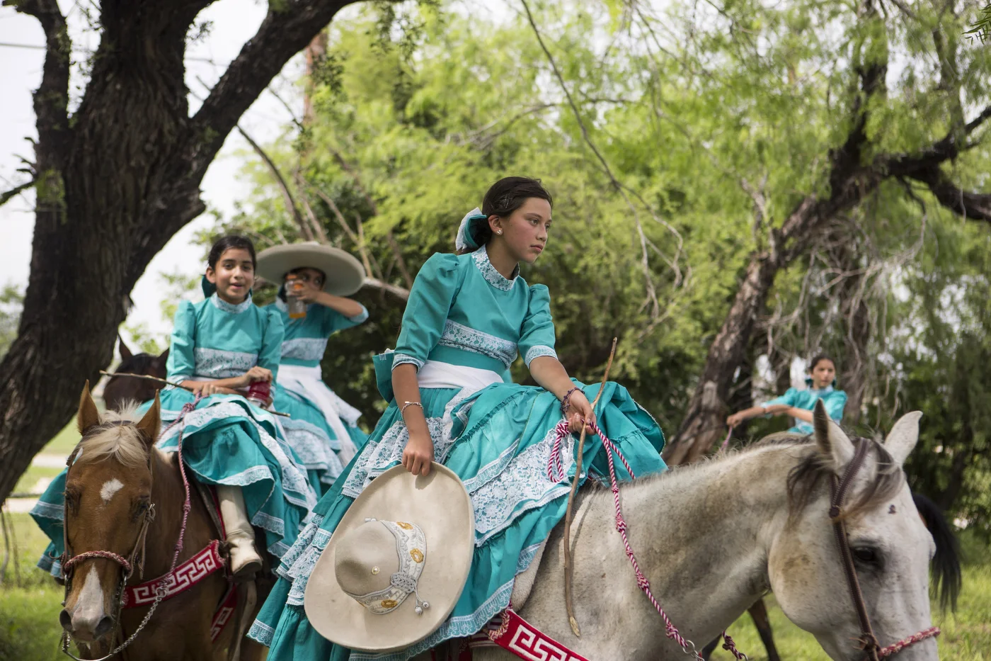  Andrea Murillo and the other team members walk their horses to cool them down after their performance during the A Day in Old Mexico charreada that is a part of San Antonio’s annual Fiesta in San Antonio, Texas on April 26, 2015. 