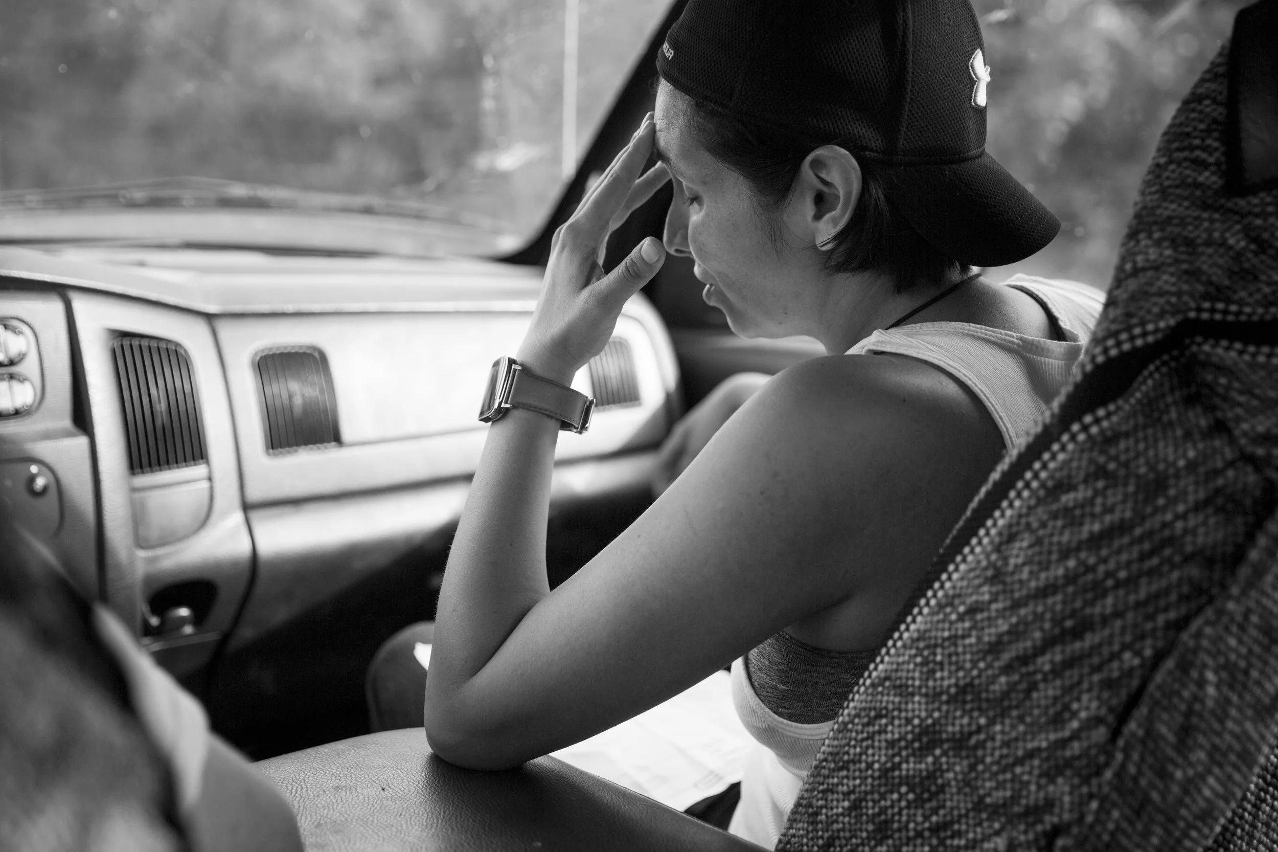  Glenda Bamberger rubs her forehead while she looks at a receipt for the sand and rocks needed to make the cement for the pillars that will hold up their new house in Blanco, Texas, U.S. on July 11, 2015.  The Bambergers' new house needs to be raised