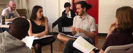 Leo Lion (center, white shirt) rehearsing Romeo + Juliet. Photo by Joanne Rendell.