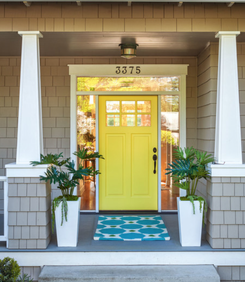 How happy does this photo make you? It makes me smile and want a yellow front door! Those simple white planters and that bright front door mat... don't you want to walk up to a house like that every day? A great YELLOW color - SUN VALLEY (Benjamin M…