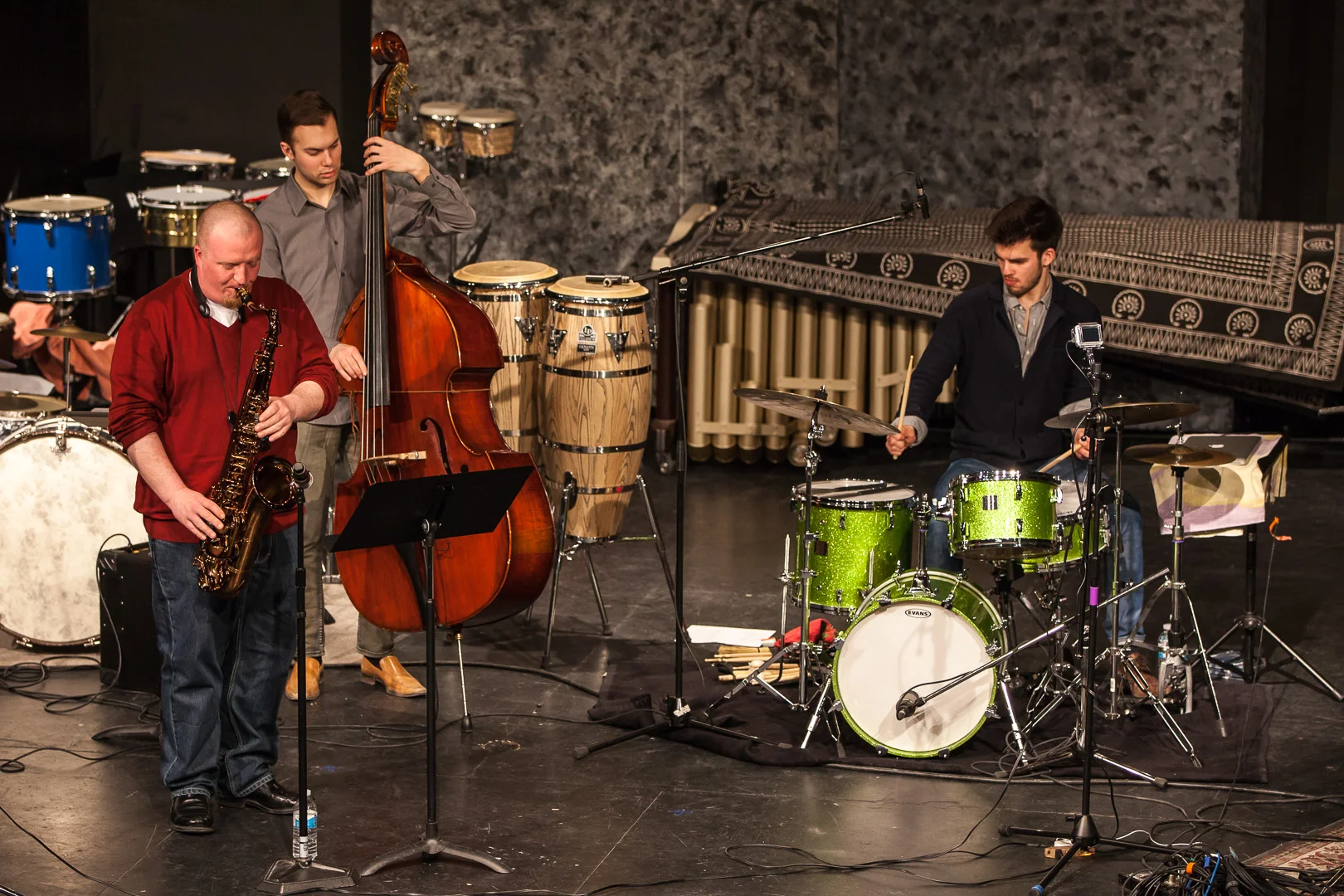 Lucas Sader performing with Paul Balcain and Karl Kohut at the 2014 Winnipeg DrumTalk Festival . Photo credit: Matt Duboff .