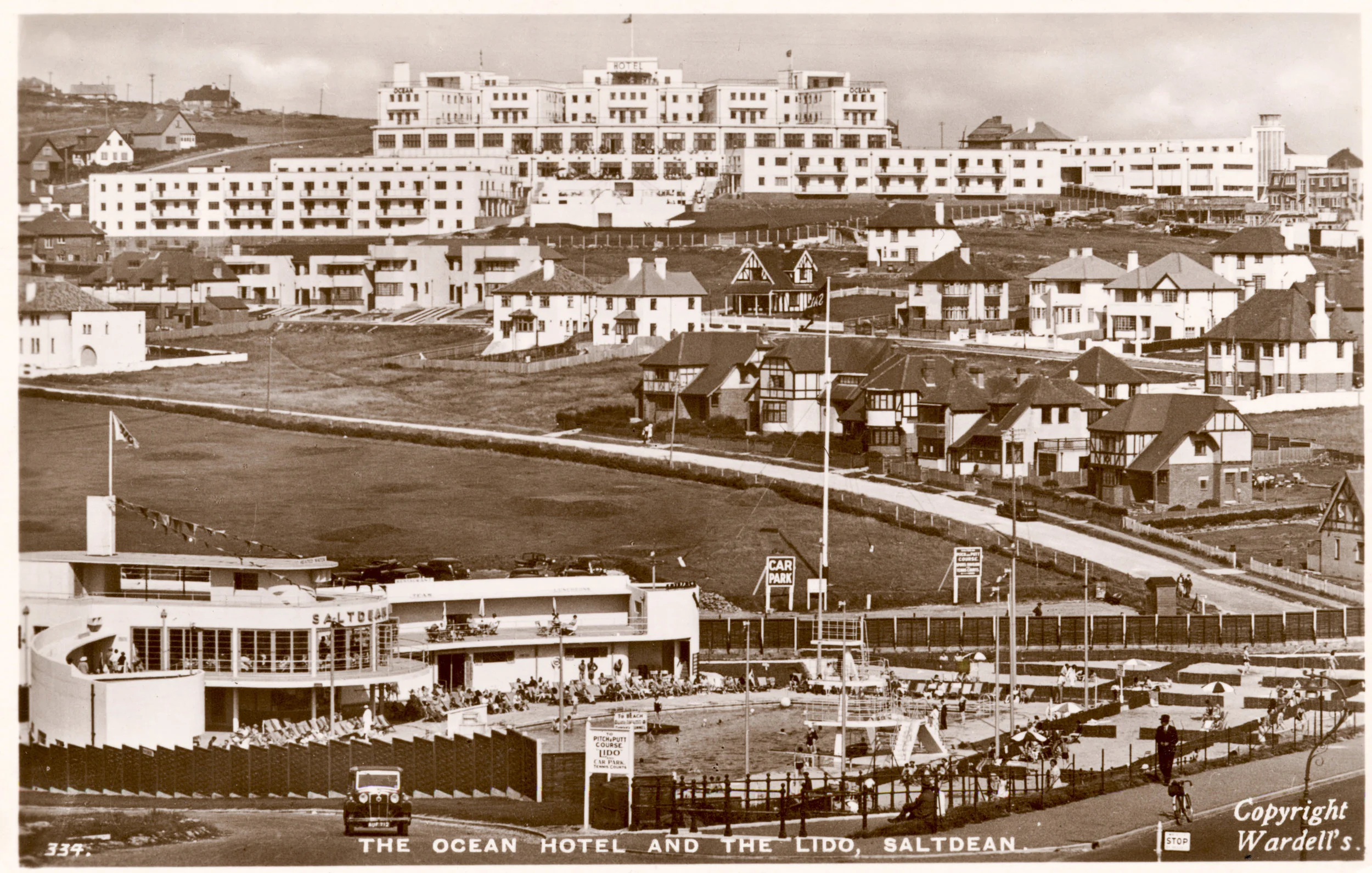Circa 1940, depicting the sister attractions, The Ocean Hotel and Saltdean Lido. Both buildings opened in 1938, and are considered to be two of the finest examples of modernist architecture in the UK.