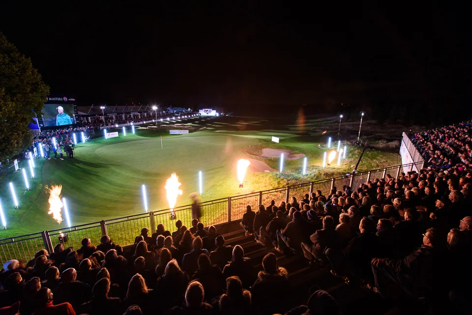 Lights surround the green with pyrotechnics to add some spice.
