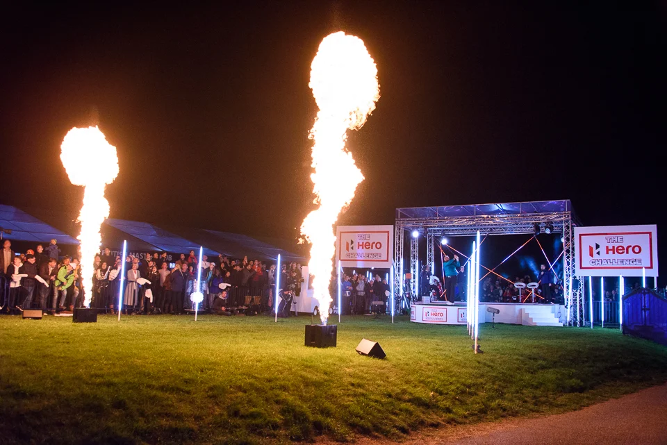 The pyrotechnics fire as the player strikes the ball.