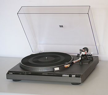 Technics SL-221 belt drive. Easy to find table; easy on the wallet. 
