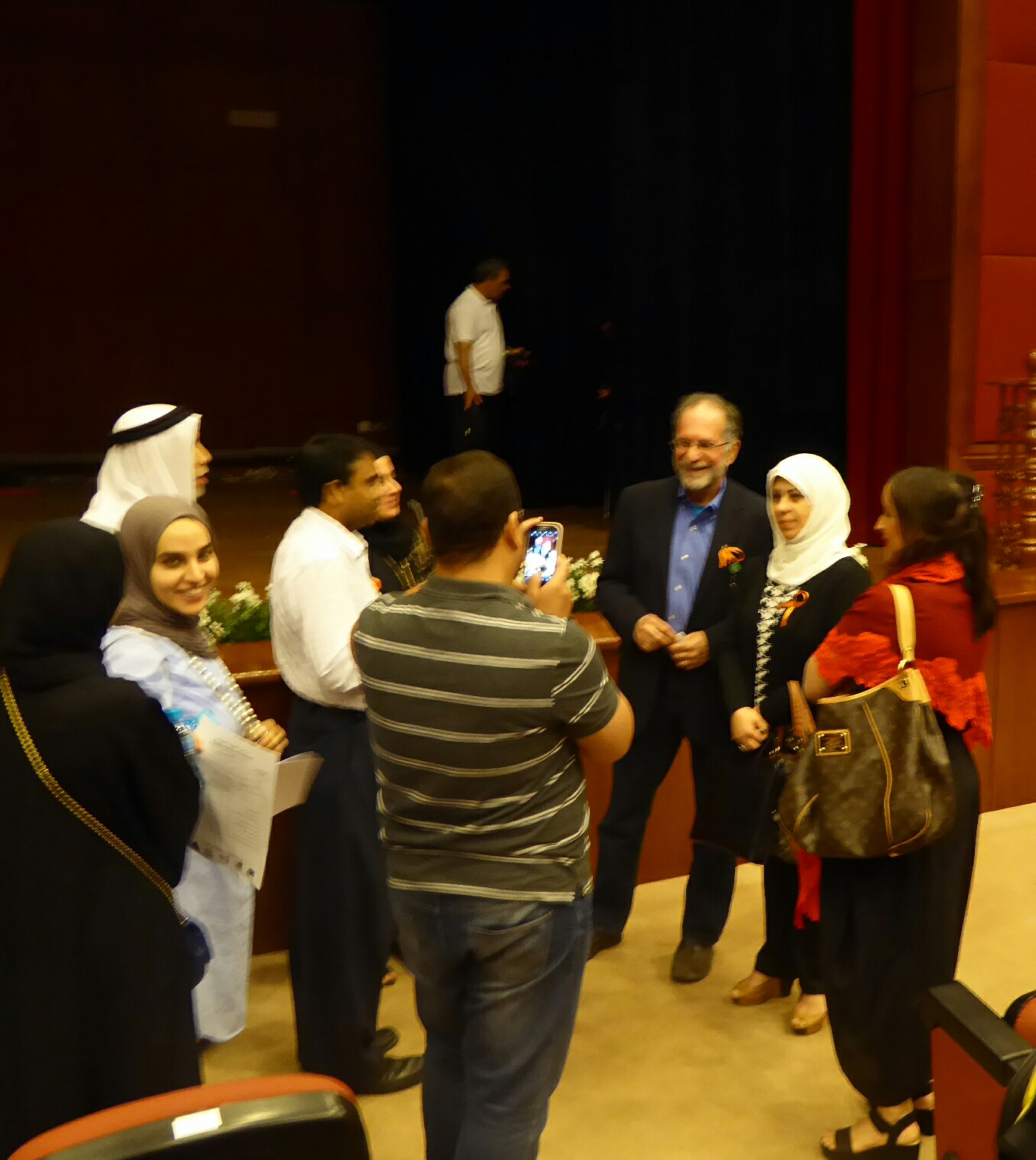 2016, answering questions after Autism in the Family lecture in Kuwait.
