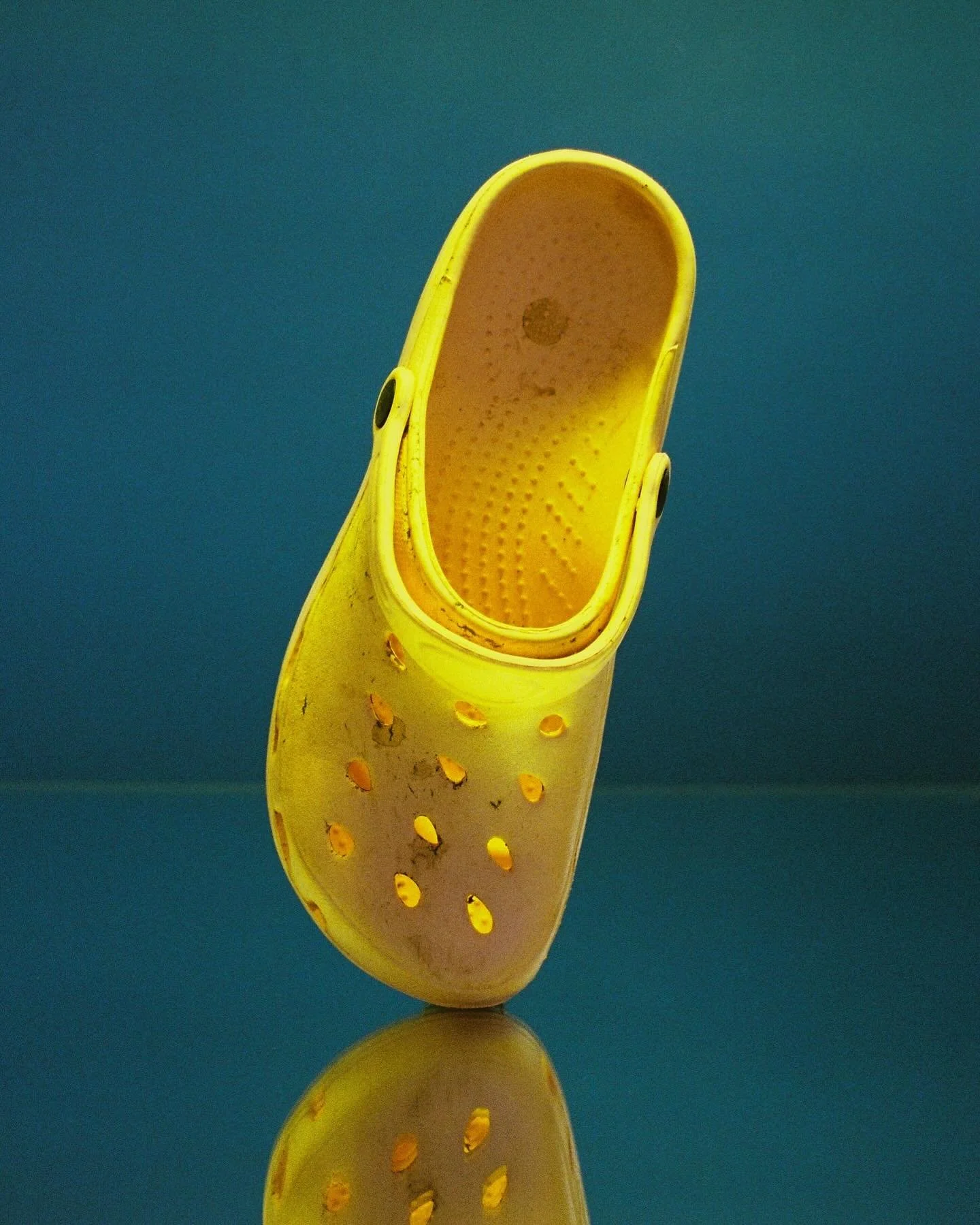 One of my friends I found in the rubbish&hellip; 
a single off brand croc. 

Shot on Kodak Gold