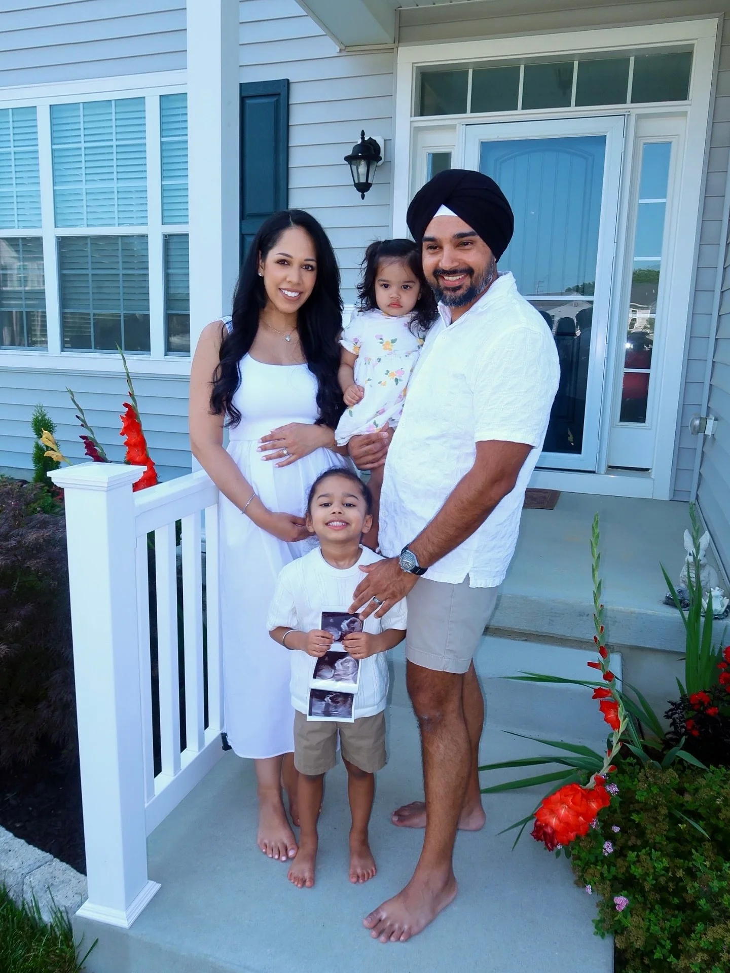 A new year, a new little love.. Baby #3 January 2026🤍🩵💗 #2026baby #pregancy 

pregnant, pregnancy announcement, pregnancy journey, pregnancy, pregnancy update, bump update, bump style, maternity style, first trimester, family photo, party of five