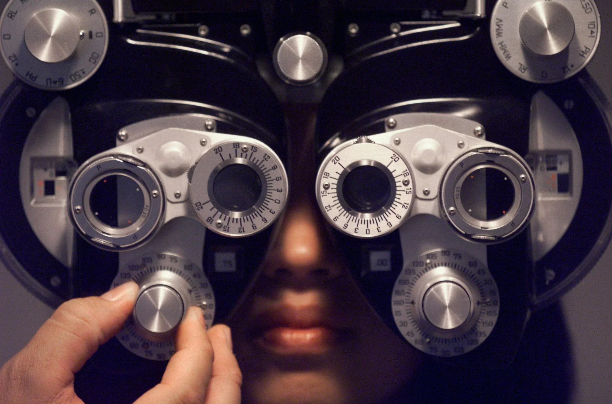An eye examination using a phoropter