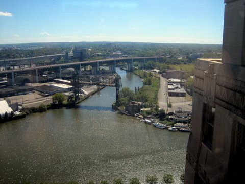 View of riverfront protection and future site of towpath along Cuyahoga River in Cleveland