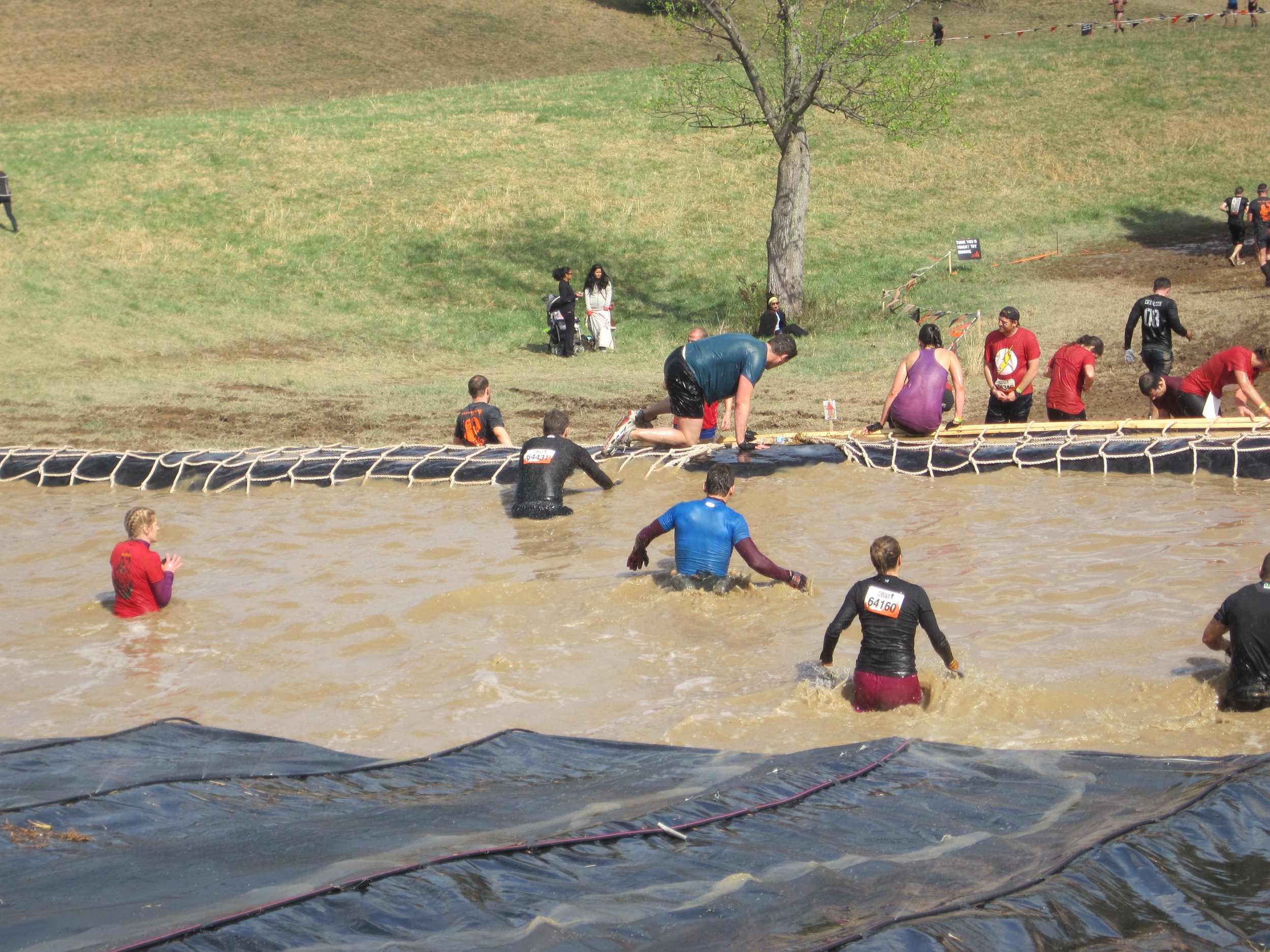  ...at least until you get to the bottom, when you're wading through more cold, muddy water. This was the fourth consecutive water obstacle in the final quarter of the race.​ 