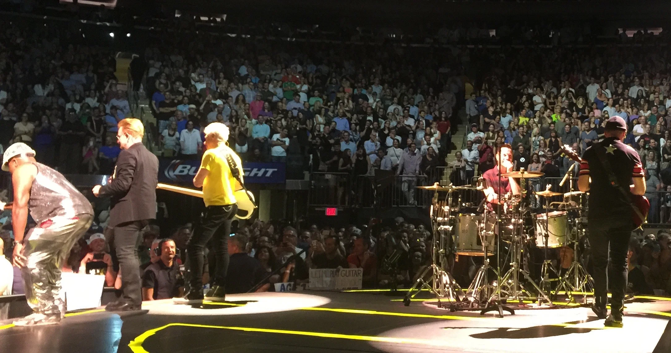 You can't see it in this photo, but Larry (seated) and Edge are losing it while the woman who called 911 for Bono after his accident in Central Park last fall rips on New Yorkers.