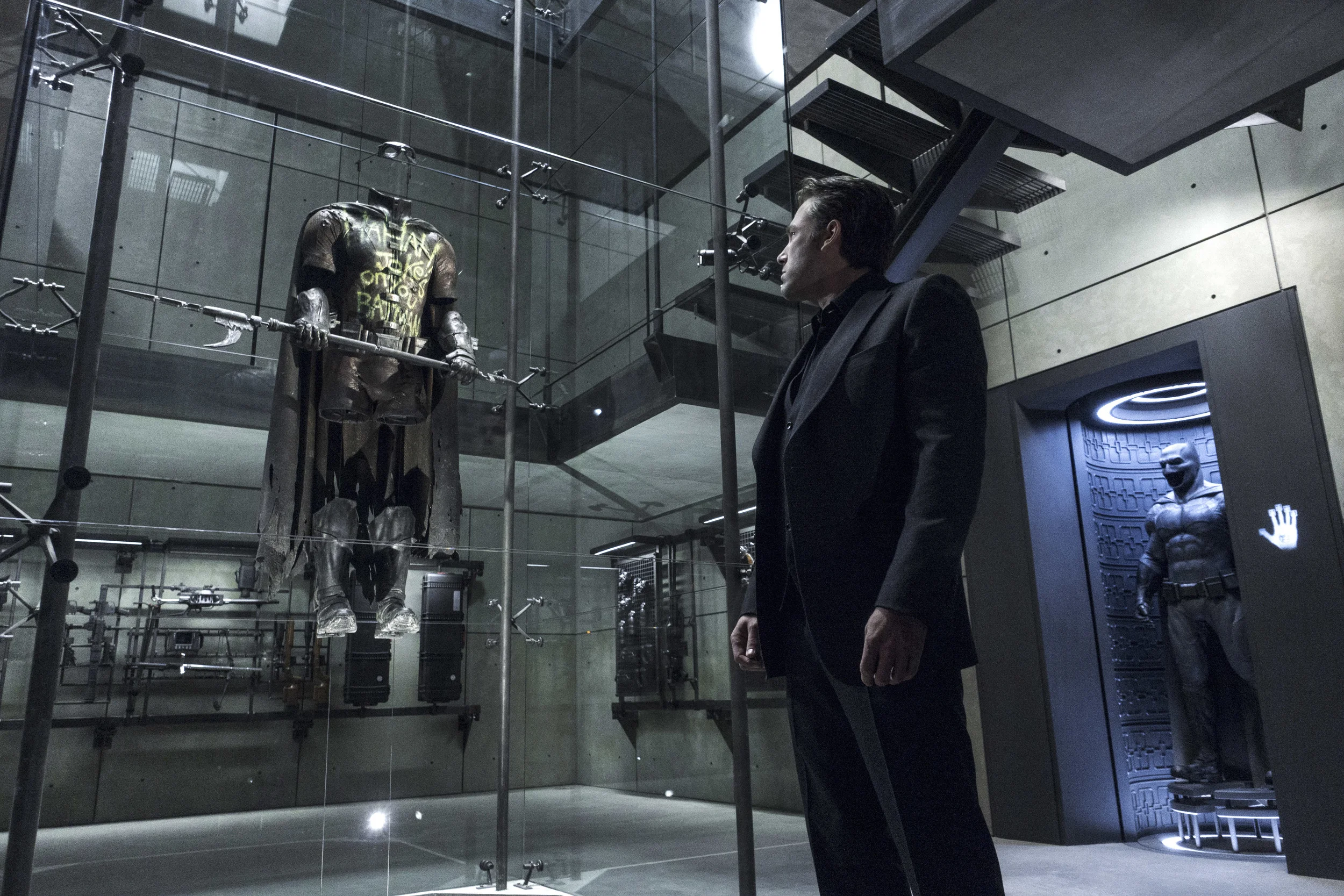 Ben Affleck's Bruce Wayne remembers his fallen partner Robin in Batman v Superman (Warners).