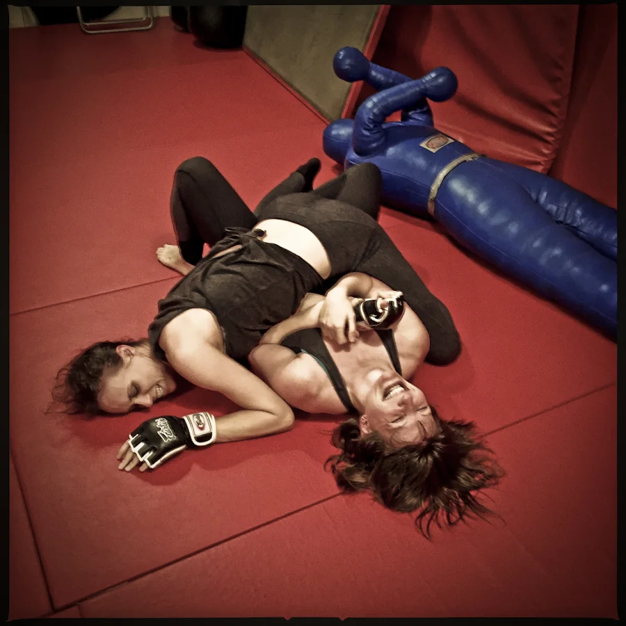 Audrey Bertaux and Jennifer J. Hopkins grapple in rehearsal for The Girl in the Red Corner. (Photo: Darrow Montgomery)