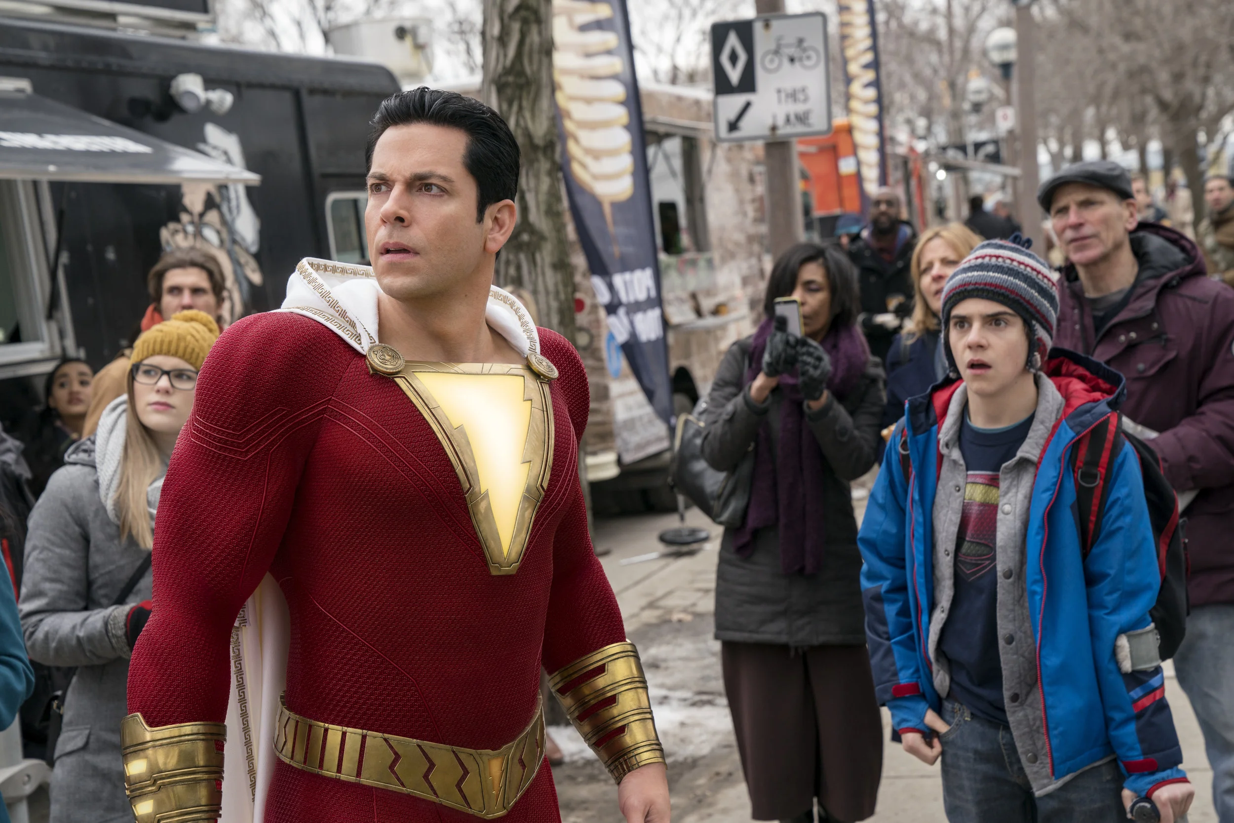 Zachary Levi and Jack Dylan Grazer in an enthusiastically punctuated superhero comedy.