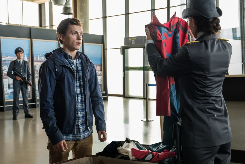 Tom Holland gets some enhanced security screening. (Sony)