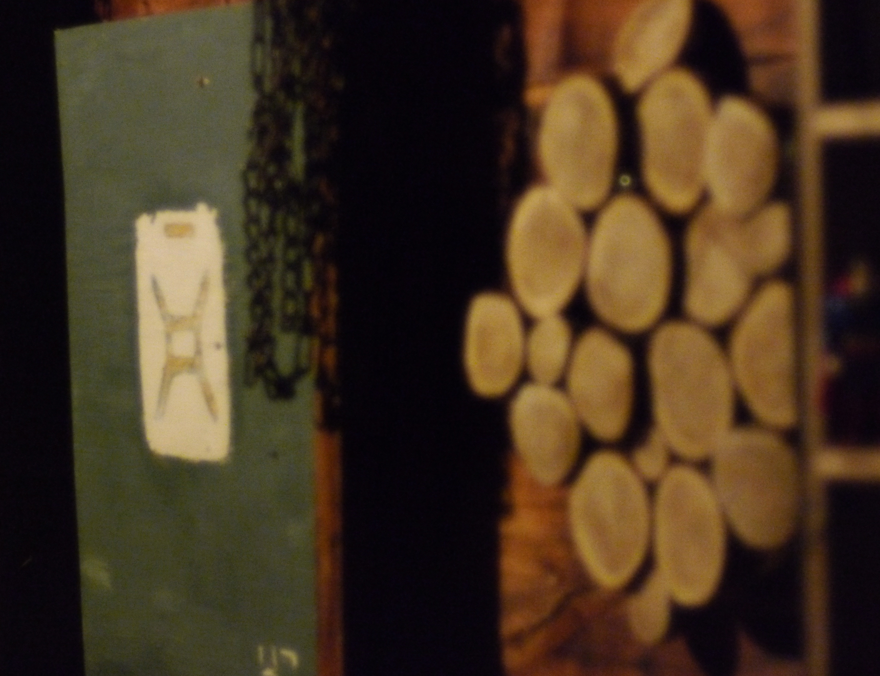 cedar rounds on wood panel