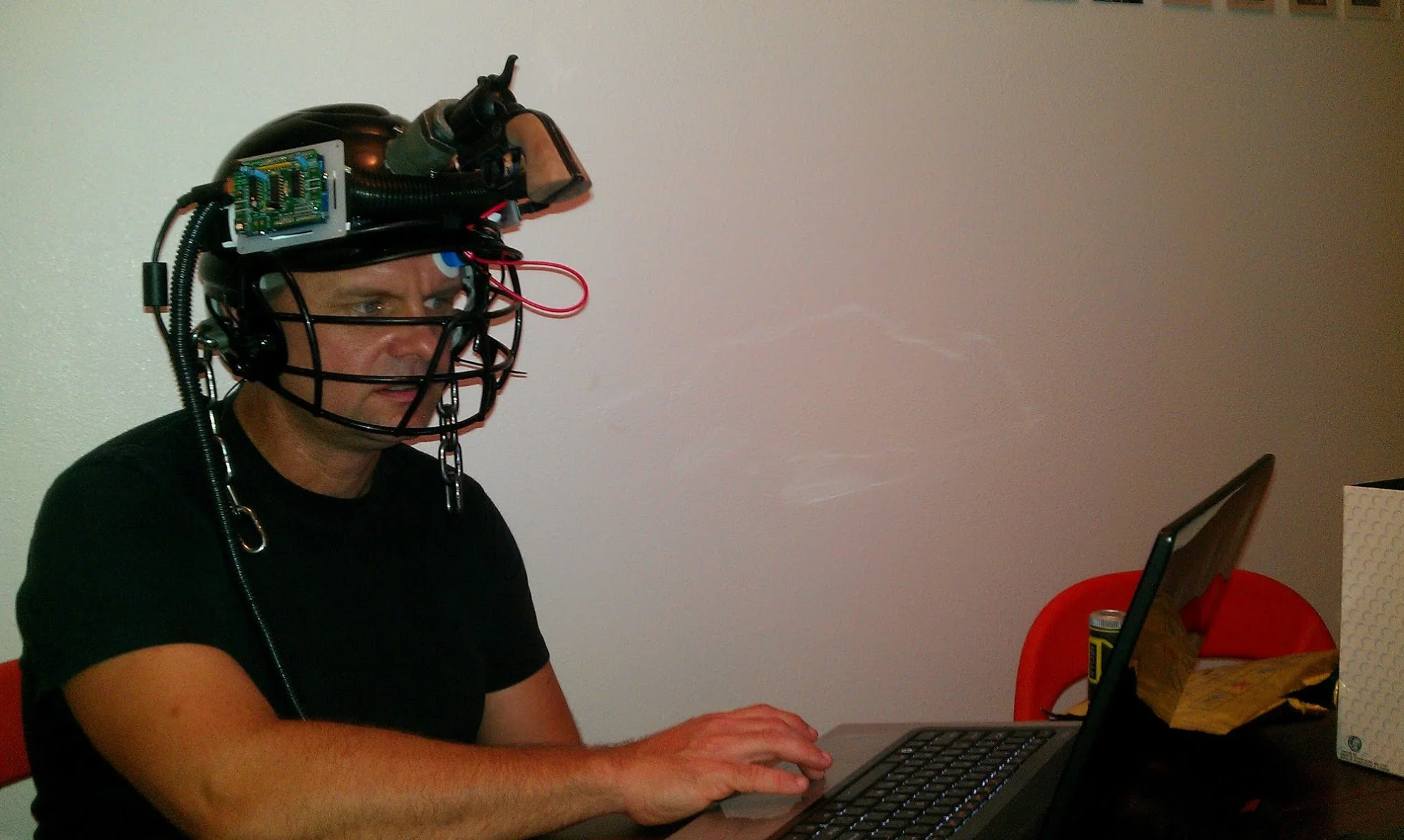 Devon tests the Bright Future helmet prior to its debut at the Art For The Survivors exhibition.