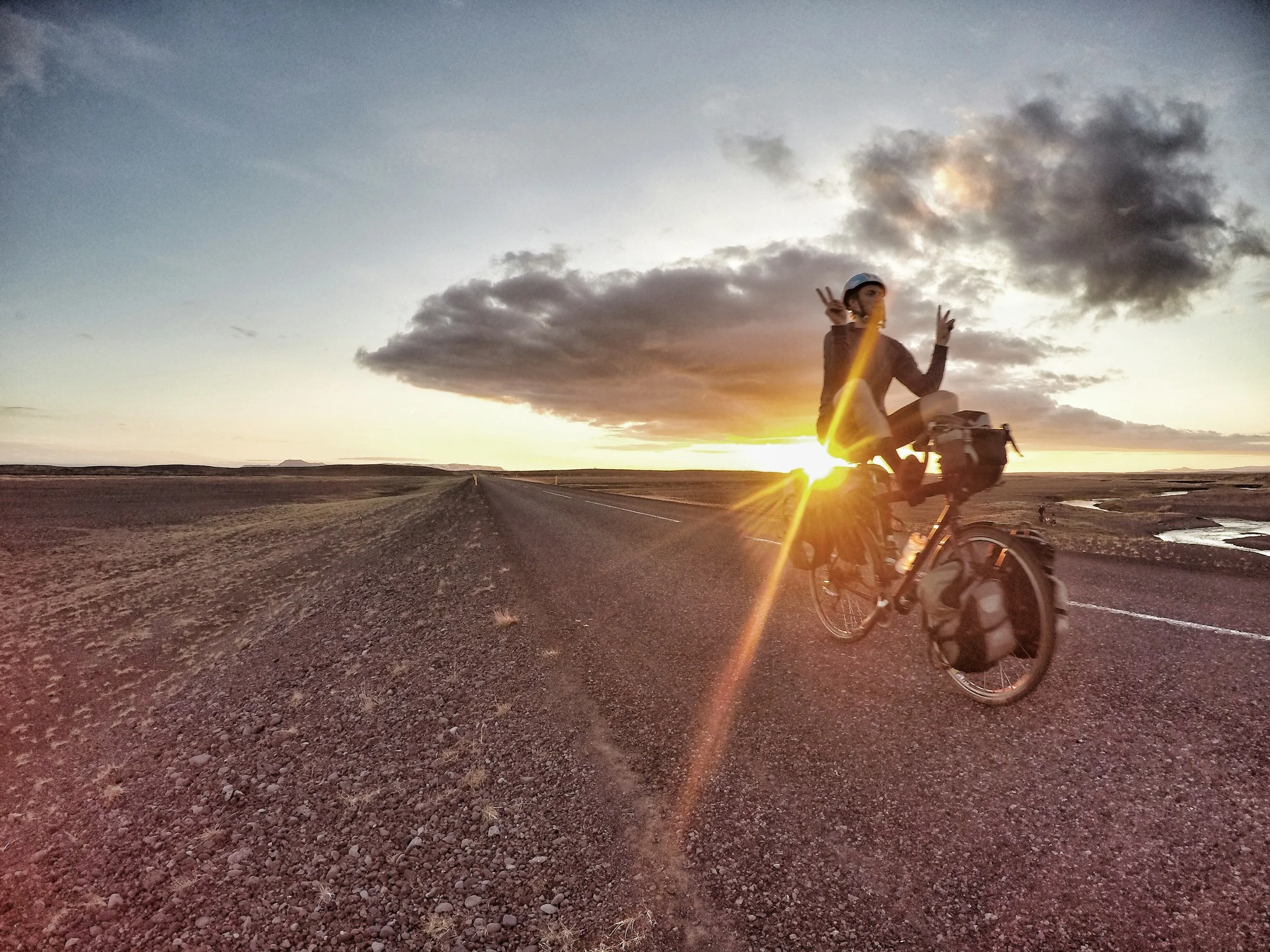 This is Iceland's busiest highway. But when you cycle in a country that has the lowest population density in Europe and where 66% of the population lives in one town, there is a lot of empty space. I took advantage of the emptiness to practice my control of my bicycle with my feet while giving a double peace sign. Peace signs are always relevant.