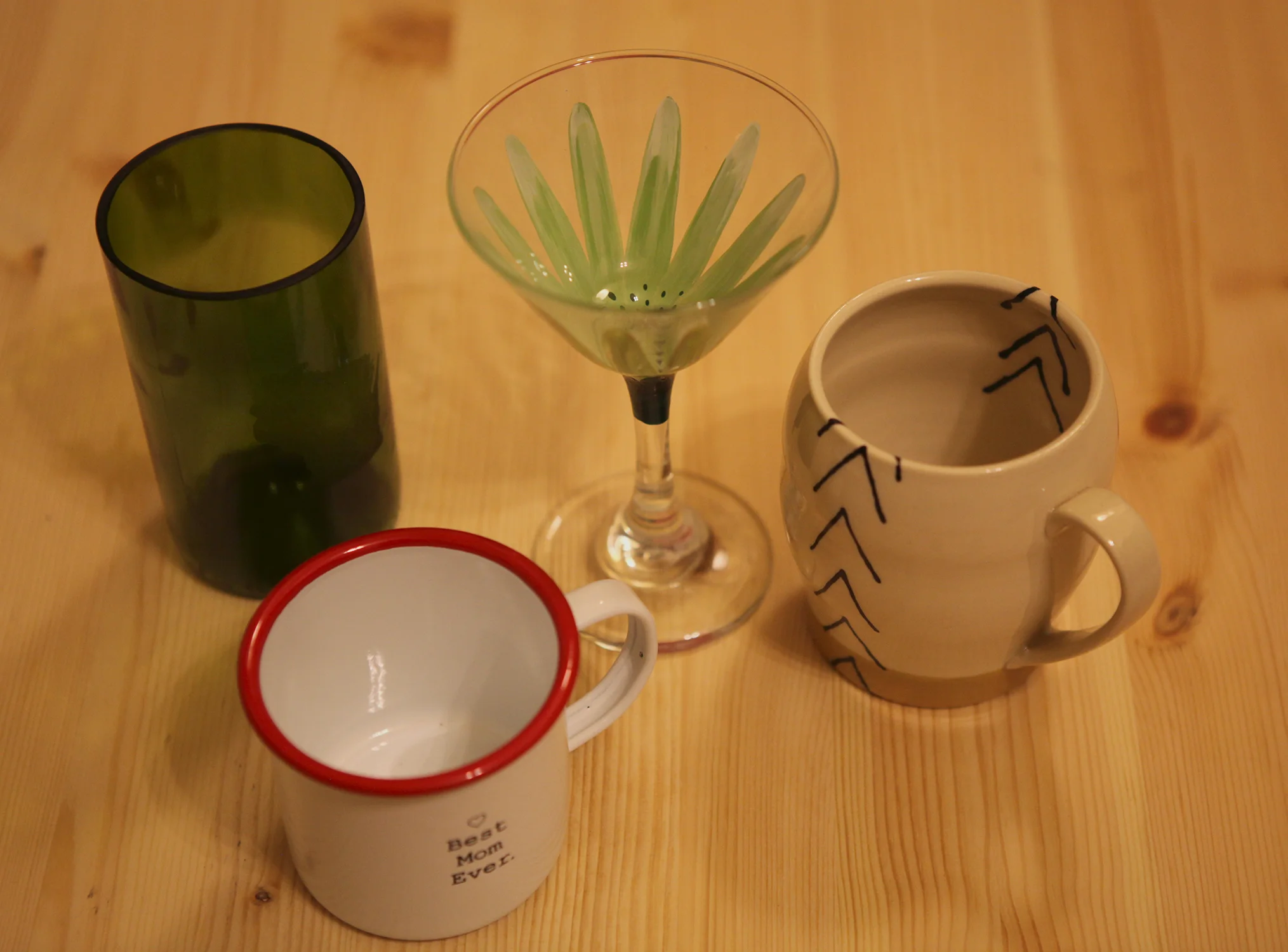 Handmade upcycled wine glass by Alonzo Artistry $15.00, Best mom ever camping mug by Meriwether of Montana $16.00, fun martini glass by Kathy Wichgers only $9.00! 